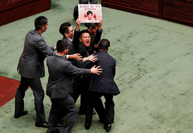 Hong Kong Assembly in Chaos; Attack on Democracy Leader a 'Chilling Signal'