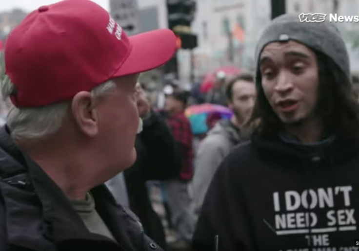 Protester Spits on Man Wearing MAGA Hat
