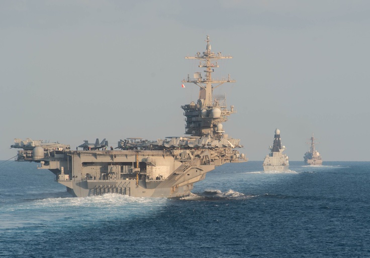 Iran Launches Missile at Mock Aircraft Carrier