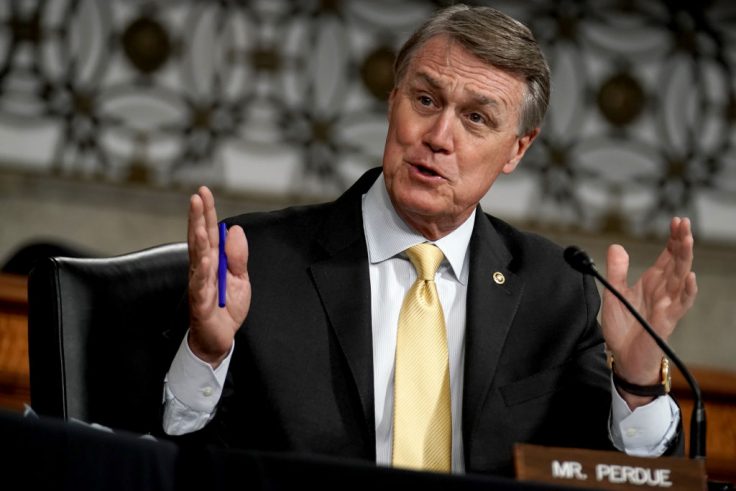 Perdue Cleared of Wrongdoing on Scrutinized Stock Trades