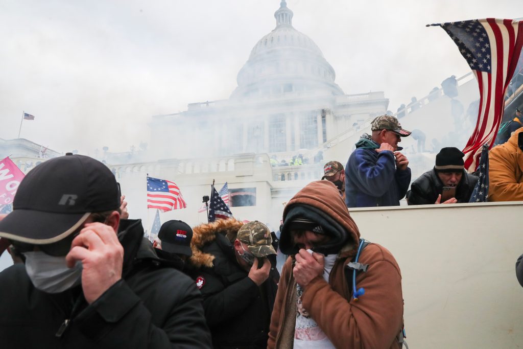 Guns and Teargas in U.S. Capitol as Trump Supporters Storm Grounds