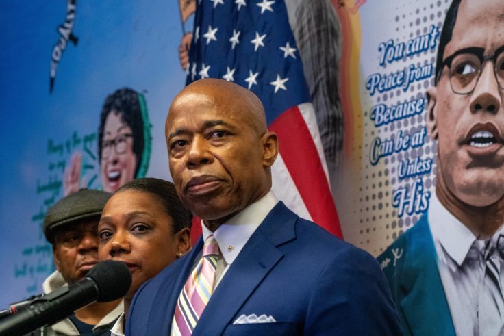 Eric Adams Names NYPD Commissioner in Front of Cop Killer Mural