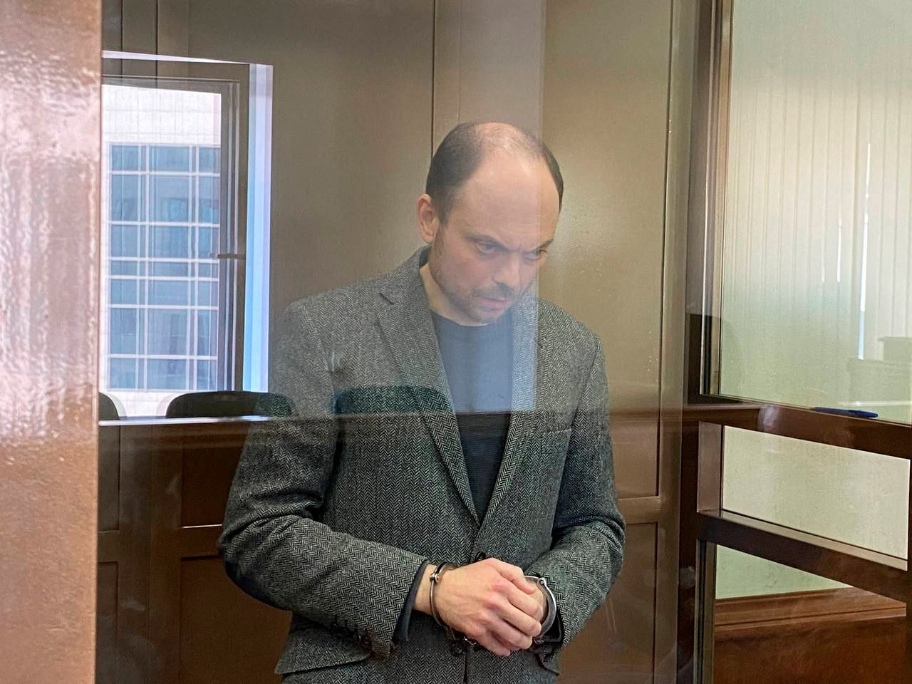 Putin Critic Sentenced to 25 Years on Treason Charges