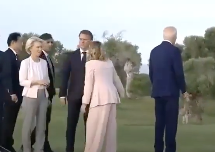 WATCH: Italian PM Corrals Biden After He Wanders Off at Summit